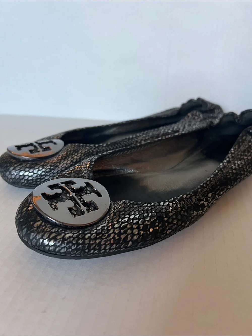 Tory Burch Black Snake-Print Embossed Reva Flats with Gold Logo
